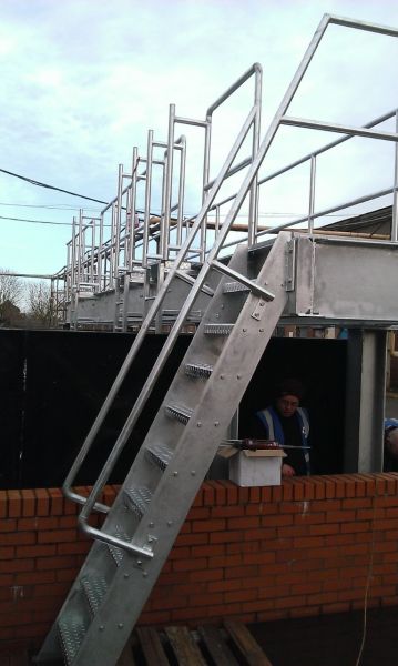 Installation of Walkway over water tank at Meggitt Coventry.: Swipe To View More Images