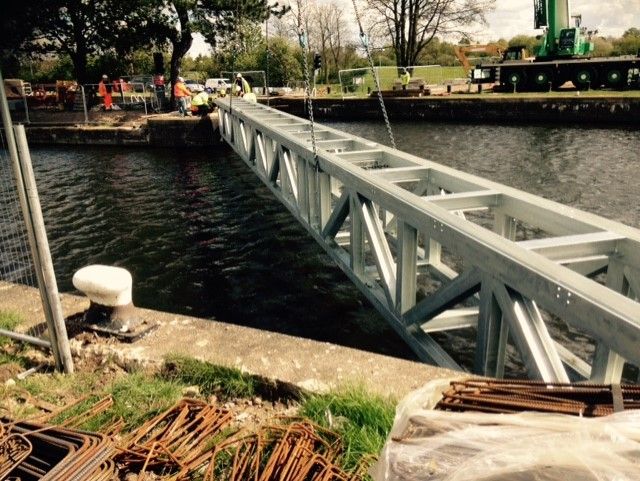 Holme Pierrepont Country Park: Installation of bridge.: Swipe To View More Images